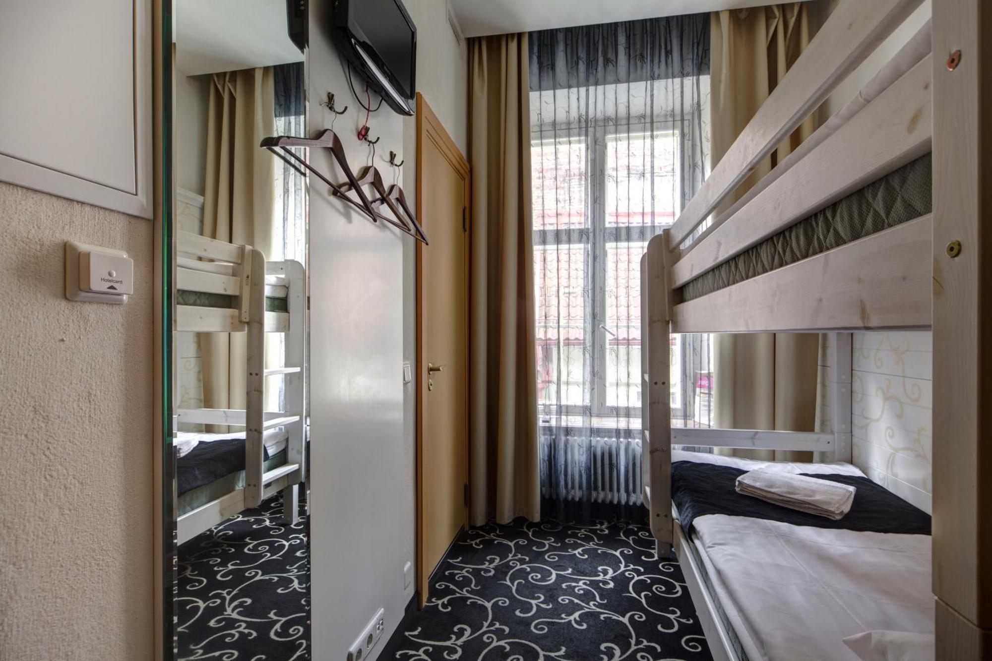 Meriton Old Town Garden Hotel Talin Quarto foto